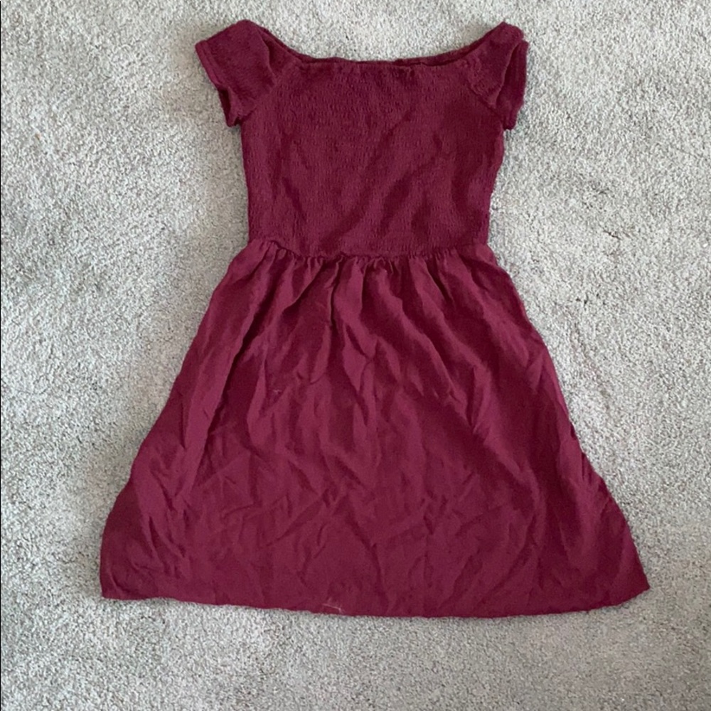 a maroon dress.